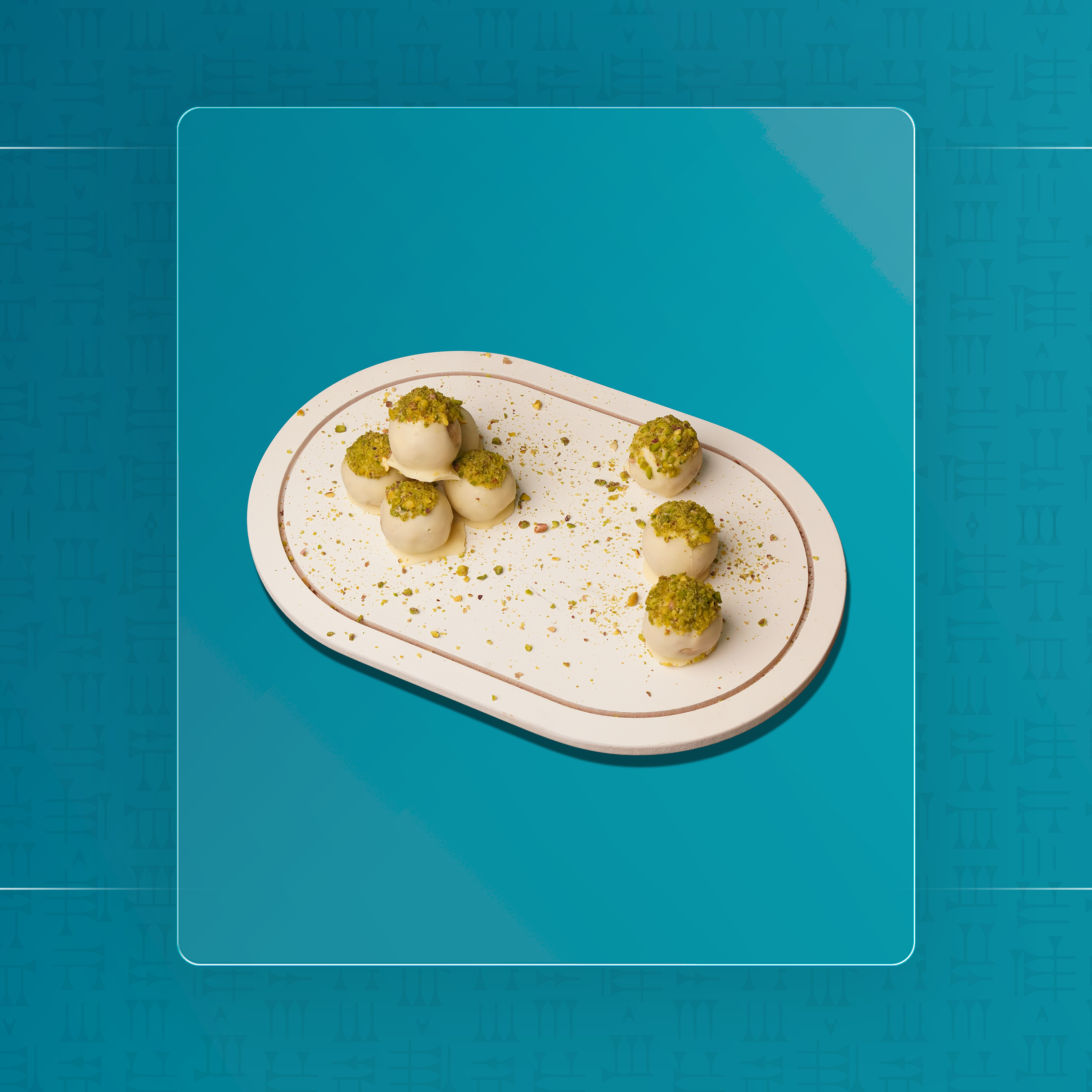 كرات جوز الهند بالفستق الحلبي مغطس بالشوكولا البلجيكية البيضاء